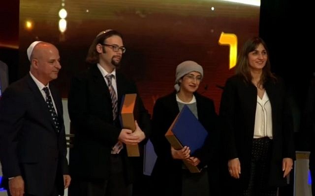 Winners of 2016 Adult International Bible Quiz, Yair Shahak (second from left) and Yafit Silman (second from right), December 28, 2016 (Screen capture: YouTube)