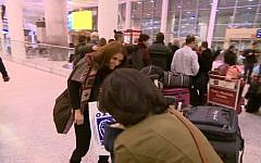 Rasha Elendari meeting her family at the airport in Canada after they were reunited thanks to the cooperation of a mosque and a synagogue in Toronto. (Screen capture CBC News)