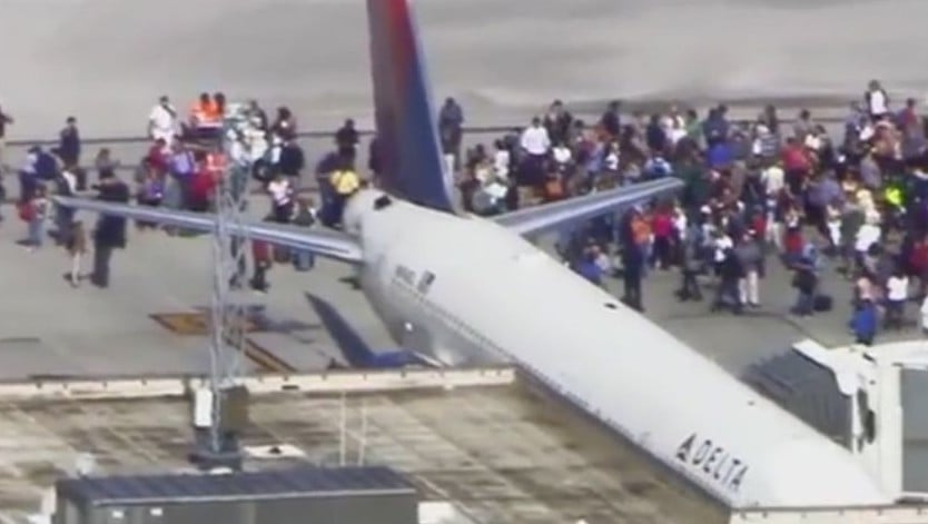 People stand on the tarmac at Fort Lauderdale airport in Florida following a shooting attack on January 6, 2017. (YouTube screenshot/ABC News) People stand on the tarmac at Fort Lauderdale airport in Florida following a shooting attack on January 6, 2017. (YouTube screenshot/ABC News)