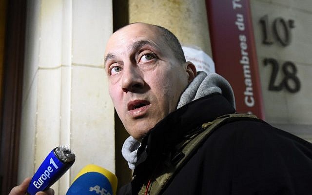 Vjeran Tomic, the main suspect in the 2010 theft of five masterpieces from the Paris Modern Art Museum, arrives at his trial on January 30, 2017, at the courthouse in Paris. (AFP PHOTO / BERTRAND GUAY)