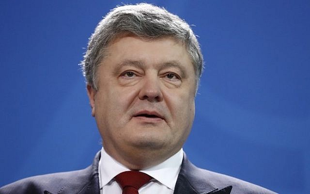 Ukraine's President Petro Poroshenko gives a joint press statement with the German Chancellor (not in picture) prior to their talks at the Chancellery in Berlin on January 30, 2017. (AFP PHOTO / Odd ANDERSEN) Ukraine's President Petro Poroshenko gives a joint press statement with the German Chancellor (not in picture) prior to their talks at the Chancellery in Berlin on January 30, 2017. (AFP PHOTO / Odd ANDERSEN)