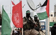 Members of Hamas's military wing the Izz ad-Din al-Qassam Brigade attending a memorial in the southern Gaza Strip city of Rafah on January 31, 2017. (AFP Photo/Said Khatib)