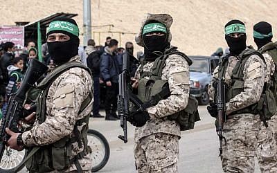 Members of the Hamas military wing at a memorial in the southern Gaza Strip town of Rafah on January 31, 2017, for Mohamed Zouari, a 49-year-old Tunisian engineer and drone expert, who was killed at the wheel of his car outside his house in Tunisia in December 2016. (AFP/Said Khatib)