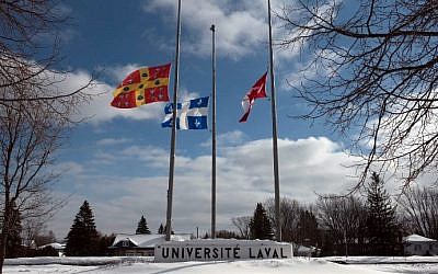 The flags (L-R) of Universite Laval, Quebec and Canada are at half-mast on campus January 31, 2017 in Quebec City, Quebec. (AFP Photo/Alice Chiche) The flags (L-R) of Universite Laval, Quebec and Canada are at half-mast on campus January 31, 2017 in Quebec City, Quebec. (AFP Photo/Alice Chiche)