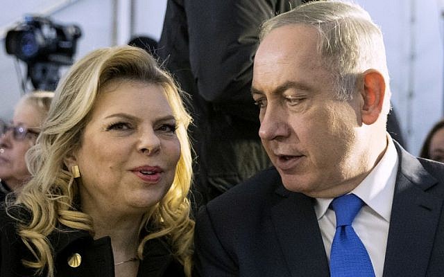 Israeli Prime Minister Benjamin Netanyahu (R) and his wife Sara) attend a memorial ceremony for Ron Nahman, the founder of Ariel, one of the largest Israeli settlements in the West Bank on February 2, 2017 in Ariel. (AFP/Jack Guez) Israeli Prime Minister Benjamin Netanyahu (R) and his wife Sara) attend a memorial ceremony for Ron Nahman, the founder of Ariel, one of the largest Israeli settlements in the West Bank on February 2, 2017 in Ariel. (AFP/Jack Guez)