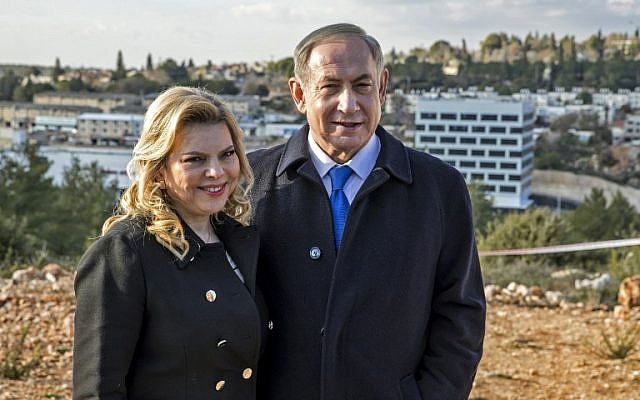 Israeli Prime Minister Benjamin Netanyahu (R) and his wife Sara (L) attend a memorial ceremony for Ron Nahman, the founder of Ariel, one of the largest Israeli settlements in the West Bank on February 2, 2017 in Ariel. (AFP PHOTO / JACK GUEZ) Israeli Prime Minister Benjamin Netanyahu (R) and his wife Sara (L) attend a memorial ceremony for Ron Nahman, the founder of Ariel, one of the largest Israeli settlements in the West Bank on February 2, 2017 in Ariel. (AFP PHOTO / JACK GUEZ)