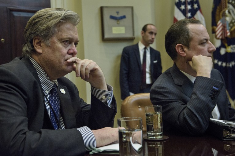 From left: Trump advisor Steve Bannon, advisor Stephen Miller and White House Chief of Staff Reince Priebus listen while US President Donald Trump speaks at the beginning of a meeting with lawmakers in the Roosevelt Room of the White House February 2, 2017 in Washington, DC. (AFP PHOTO / Brendan Smialowski) From left: Trump advisor Steve Bannon, advisor Stephen Miller and White House Chief of Staff Reince Priebus listen while US President Donald Trump speaks at the beginning of a meeting with lawmakers in the Roosevelt Room of the White House February 2, 2017 in Washington, DC. (AFP PHOTO / Brendan Smialowski)