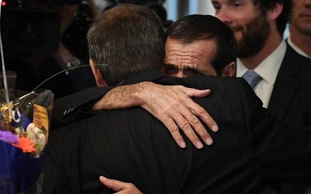 Ali Vayeghan (R) hugs his brother Hossein upon arrival at Los Angeles International Airport after he was previously barred entry and deported from the United States under President Trumps travel ban, in Los Angeles, California on February 2, 2017 (AFP PHOTO / Mark RALSTON) Ali Vayeghan (R) hugs his brother Hossein upon arrival at Los Angeles International Airport after he was previously barred entry and deported from the United States under President Trumps travel ban, in Los Angeles, California on February 2, 2017 (AFP PHOTO / Mark RALSTON)