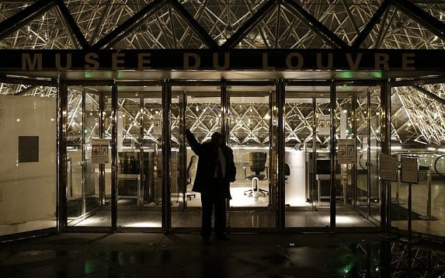 A security guard gestures at the entrance of the Louvre museum in Paris, on February 3, 2017, after a French soldier patrolling at the Louvre shot and seriously injured a machete-wielding attacker earlier. (AFP/Geoffroy Van Der Hasselt) A security guard gestures at the entrance of the Louvre museum in Paris, on February 3, 2017, after a French soldier patrolling at the Louvre shot and seriously injured a machete-wielding attacker earlier. (AFP/Geoffroy Van Der Hasselt)