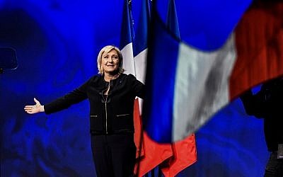 Head of the French far-right party Front national (FN) and presidential candidate Marine Le Pen arrives on stage to give a speech, on February 5, 2017. (AFP Photo/Jeff Pachoud)