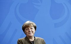 German Chancellor Angela Merkel smiles during a meeting with the new president of Germany's Upper House of Parliament and Rhineland-Palatinate State Premier Malu Dreyer (not pictured) in Berlin on February 10, 2017. (AFP Photo/Odd Andersen)