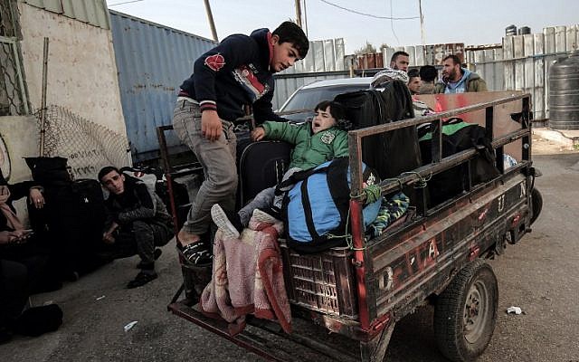 Palestinians wait for travel permits to cross into Egypt through the Rafah border crossing after it was opened by Egyptian authorities for humanitarian cases, in Rafah in the southern Gaza Strip on February 11, 2017. ( AFP PHOTO / SAID KHATIB) Palestinians wait for travel permits to cross into Egypt through the Rafah border crossing after it was opened by Egyptian authorities for humanitarian cases, in Rafah in the southern Gaza Strip on February 11, 2017. ( AFP PHOTO / SAID KHATIB)