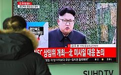A man watches the news showing file footage of North Korean leader Kim Jong-Un at a railway station in Seoul, South Korea on February 12, 2017.
(Jung Yeon-Je/AFP)