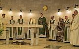 Cardinal Rainer Woelki (C) leads a mass at the Church of the Multiplication of the Loaves and Fish in Tabgha, on February 12, 2017, upon its reopening following eight months of renovation. (AFP PHOTO / JACK GUEZ)