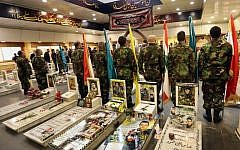 Hezbollah militants attend a ceremony at the Martyr's cemetery in a southern suburb of the Lebanese capital, Beirut, on February 12, 2017. (AFP/ ANWAR AMRO)