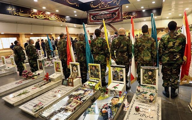 Hezbollah militants attend a ceremony at the Martyr's cemetery in a southern suburb of the Lebanese capital, Beirut, on February 12, 2017. (AFP/ ANWAR AMRO)