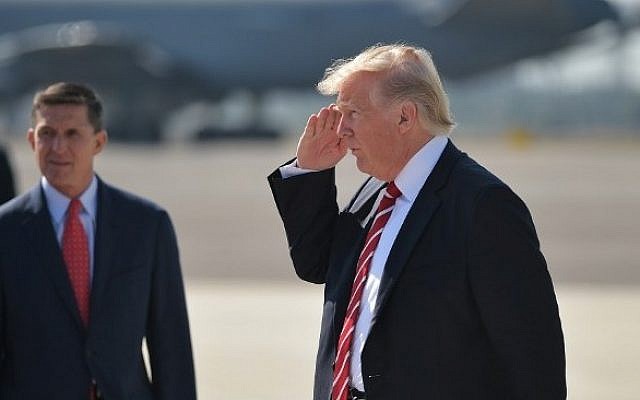 Then-National Security Adviser Michael Flynn (L) and US President Donald Trump (R) upon arrival at MacDill Air Force Base in Tampa, Florida, February 06, 2017. (AFP PHOTO / MANDEL NGAN) Then-National Security Adviser Michael Flynn (L) and US President Donald Trump (R) upon arrival at MacDill Air Force Base in Tampa, Florida, February 06, 2017. (AFP PHOTO / MANDEL NGAN)