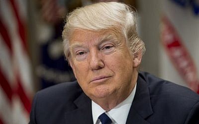 US President Donald Trump speaks during a meeting with teachers, school administrators and parents in the Roosevelt Room of the White House in Washington, DC, February 14, 2017. (AFP/SAUL LOEB)
