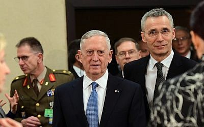 US Defence Minister James Mattis (C) and NATO Secretary General Jens Stoltenberg arrive to attend a NATO defense ministers meetings at NATO headquarters in Brussels, Belgium, on February 15, 2017. (AFP/ Emmanuel Dunand)