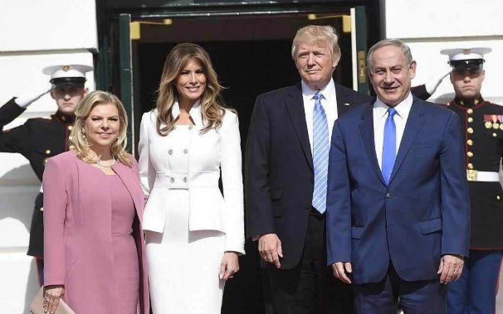 US President Donald Trump and First Lady Melania Trump welcome Israeli Prime Minister Benjamin Netanyahu and his wife, Sara, as they arrive at the White House in Washington, DC, February 15, 2017. (AFP PHOTO / SAUL LOEB)
