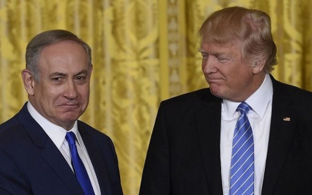 US President Donald Trump, right, and Israeli Prime Minister Benjamin Netanyahu during a joint press conference in the East Room of the White House in Washington, DC, February 15, 2017. (AFP/Saul Loeb) US President Donald Trump, right, and Israeli Prime Minister Benjamin Netanyahu during a joint press conference in the East Room of the White House in Washington, DC, February 15, 2017. (AFP/Saul Loeb)