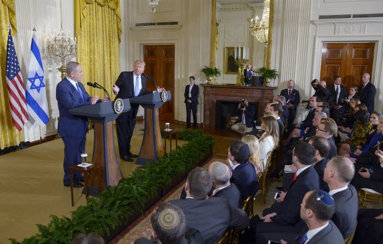 US President Donald Trump and Prime Minister Benjamin Netanyahu hold a joint press conference in the East Room of the White House in Washington, DC, February 15, 2017. (AFP PHOTO / MANDEL NGAN) US President Donald Trump and Prime Minister Benjamin Netanyahu hold a joint press conference in the East Room of the White House in Washington, DC, February 15, 2017. (AFP PHOTO / MANDEL NGAN)