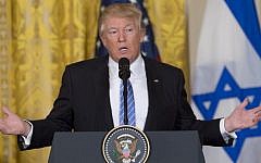 US President Donald Trump speaks during a joint press conference with Israeli Prime Minister Benjamin Netanyahu in the East Room of the White House in Washington, DC, February 15, 2017. (AFP/SAUL LOEB)