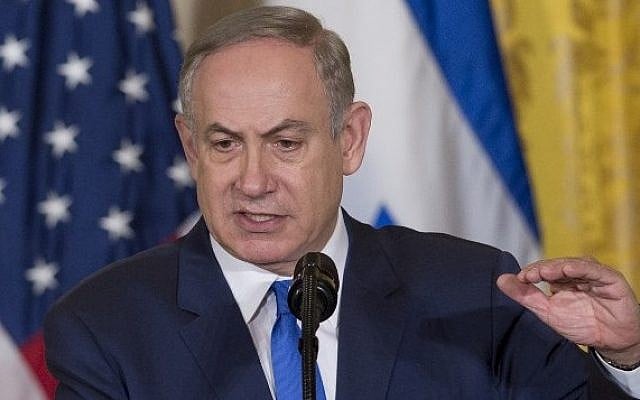 Prime Minister Benjamin Netanyahu speaks during a joint press conference with US President Donald Trump in the East Room of the White House in Washington, DC, February 15, 2017. (AFP/SAUL LOEB)