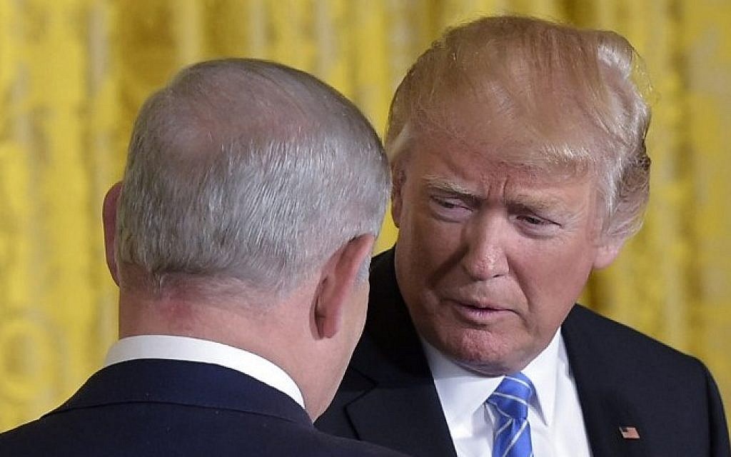 US President Donald Trump and Israel's Prime Minister Benjamin Netanyahu shake hands during a joint press conference in the East Room of the White House, on February 15, 2017, in Washington, DC.  (AFP/Mandel Ngan)
