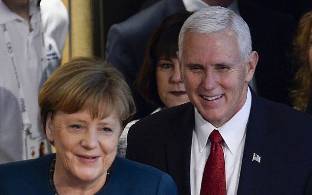 German Chancellor Angela Merkel (L) and US Vice President Mike Pence arrive at the 2nd day of the 53rd Munich Security Conference (MSC) at the Bayerischer Hof hotel in Munich, southern Germany, on February 18, 2017. (AFP PHOTO / THOMAS KIENZLE) German Chancellor Angela Merkel (L) and US Vice President Mike Pence arrive at the 2nd day of the 53rd Munich Security Conference (MSC) at the Bayerischer Hof hotel in Munich, southern Germany, on February 18, 2017. (AFP PHOTO / THOMAS KIENZLE)