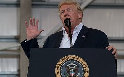 US President Donald Trump addresses a rally at the Orlando Melbourne International Airport on February 18, 2017 in Melbourne, Florida. (Nicholas Kamm/AFP) US President Donald Trump addresses a rally at the Orlando Melbourne International Airport on February 18, 2017 in Melbourne, Florida. (Nicholas Kamm/AFP)