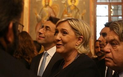 France's far-right presidential candidate Marine Le Pen (C) and French MP Gilbert Collard (R) listen to a priest as they visit the Saint George Greek Orthodox Cathedral in downtown Beirut on February 20, 2017. (AFP Photo/Patrick Baz) France's far-right presidential candidate Marine Le Pen (C) and French MP Gilbert Collard (R) listen to a priest as they visit the Saint George Greek Orthodox Cathedral in downtown Beirut on February 20, 2017. (AFP Photo/Patrick Baz)