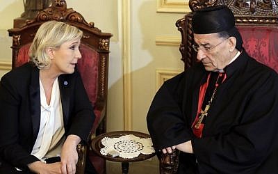 France's far-right presidential candidate Marine Le Pen (L) meets with Lebanon's Cardinal Mar Bechara Boutros al-Rai (R) at the Maronite Patriarchate in Bekerke north of Beirut on February 21, 2017. (AFP Photo/Joseph Eid)