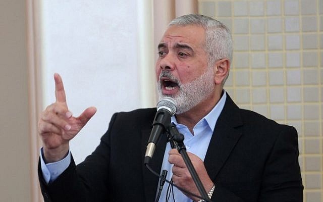 Former Hamas prime minister in the Gaza Strip Ismail Haniya speaks in the presence of the new leader of Hamas in the Gaza Strip, during the opening of a new mosque in Rafah in the southern Gaza Strip on February 24, 2017. (AFP PHOTO / SAID KHATIB)