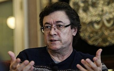 Turkish director Hudaverdi Yavuz answers AFP journalists' questions during an interview on February 4, 2017, in Istanbul. (AFP Photo/Bulent Kilic)