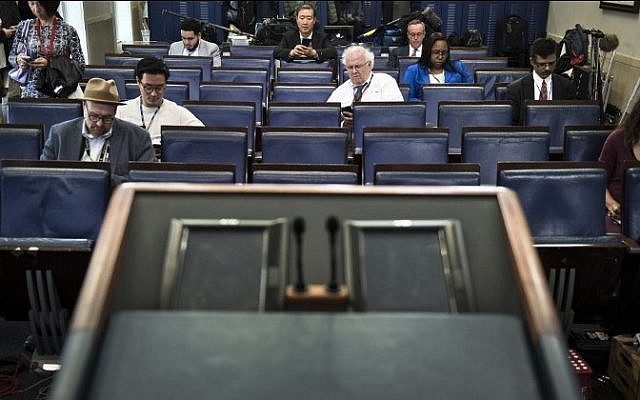 An empty podium is seen as an off camera briefing is held with a small group of reporters and White House Press Secretary Sean Spicer instead of the normal on camera briefing in the White House February 24, 2017 in Washington, DC. (AFP PHOTO / Brendan Smialowski) An empty podium is seen as an off camera briefing is held with a small group of reporters and White House Press Secretary Sean Spicer instead of the normal on camera briefing in the White House February 24, 2017 in Washington, DC. (AFP PHOTO / Brendan Smialowski)