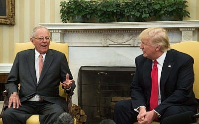 US President Donald Trump meets with Peruvian President Pedro Pablo Kuczynski in the Oval Office at the White House in Washington on February 24, 2017. ( AFP PHOTO / NICHOLAS KAMM)