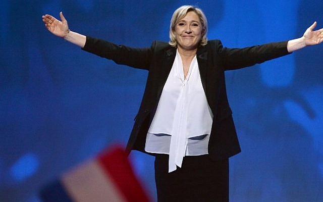 French far-right National Front (FN) party candidate for the presidential election Marine Le Pen waves, as she arrives at a campaign rally at the Zenith de Nantes venue in Saint-Herblain on February 26, 2017. (AFP Photo/Jean-Francois Monier) French far-right National Front (FN) party candidate for the presidential election Marine Le Pen waves, as she arrives at a campaign rally at the Zenith de Nantes venue in Saint-Herblain on February 26, 2017. (AFP Photo/Jean-Francois Monier)