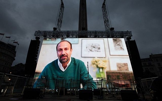 Iranian filmmaker Asghar Farhadi speaks in a recorded video message during the public screening for the film 'The Salesman' in Trafalgar Square in central London on February 26, 2017. (AFP PHOTO / Daniel LEAL-OLIVAS) Iranian filmmaker Asghar Farhadi speaks in a recorded video message during the public screening for the film 'The Salesman' in Trafalgar Square in central London on February 26, 2017. (AFP PHOTO / Daniel LEAL-OLIVAS)