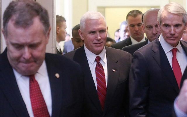 US Vice President Mike Pence, center, departs a Republican policy lunch with Sen. Rob Portman (R-OH), right, on Capitol Hill, Washington DC, February 14, 2017. (Mario Tama/Getty Images/AFP)