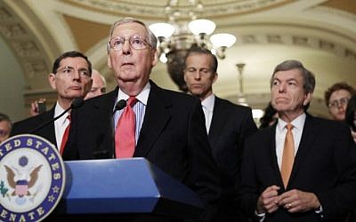 From left to right, Sen. John Barrasso (R-WY), Senate Majority Leader Mitch McConnell (R-KY), Sen. John Thune (R-SD) and Sen. Roy Blount (R-MO) stand during a news conference on Capitol Hill following a policy lunch on February 14, 2017 in Washington, DC. Mario Tama/Getty Images/AFP)