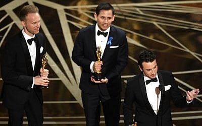 (L-R) Songwriters Justin Paul, Benj Pasek and Justin Hurwitz accept Best Original Song for 'City of Stars' from 'La La Land' onstage during the 89th Annual Academy Awards at Hollywood and Highland Center on February 26, 2017 in Hollywood, California. (Kevin Winter/Getty Images/AFP)