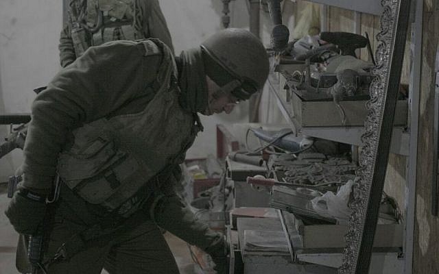 IDF troops raid a suspected gunsmithing workshop in the West Bank village of Bayt Liqya on February 16, 2017. (IDF Spokesperson's Unit) IDF troops raid a suspected gunsmithing workshop in the West Bank village of Bayt Liqya on February 16, 2017. (IDF Spokesperson's Unit)