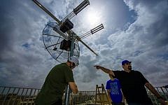 Installing the satellite dish that will receive the data transmitted from BGUSAT and send it to the ground station at Ben-Gurion University's  Earth and Planetary Image Facility, March 2016. (Dani Machlis/BGU)