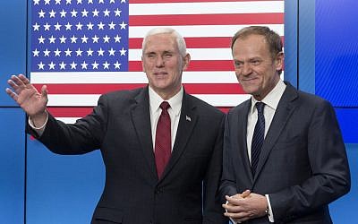 United States Vice President Mike Pence, left, gestures after shaking hands with EU Council President Donald Tusk as he arrives at the European Council building in Brussels, Belgium, on Monday, Feb. 20, 2017. (AP Photo/Thierry Monasse)