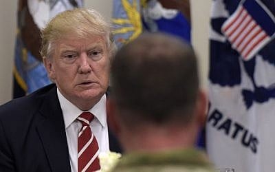 President Donald Trump has lunch with troops while visiting US Central Command and US Special Operations Command at MacDill Air Force Base, Fla., Monday, Feb. 6, 2017. (AP Photo/Susan Walsh)