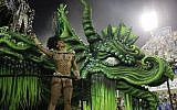 A performer from Mocidade samba school parades on a float during the Carnival celebrations at the Sambadrome in Rio de Janeiro, Brazil, February 8, 2016. (AP/Leo Correa)