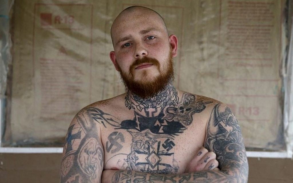 Shane Johnson displays some of his tattoos as he poses in his home in Tippecanoe, Indiana, Thursday, Jan. 12, 2017. (AP Photo/Michael Conroy) Shane Johnson displays some of his tattoos as he poses in his home in Tippecanoe, Indiana, Thursday, Jan. 12, 2017. (AP Photo/Michael Conroy)