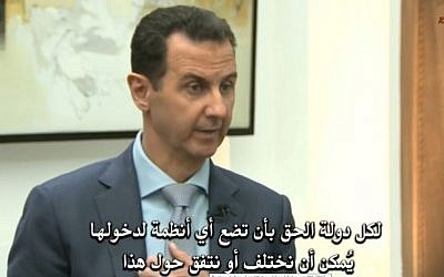 Screen capture of Syrian President Bashar Assad during an interview with media, February 2017. (Screen capture: R&U Videos/YouTube) Screen capture of Syrian President Bashar Assad during an interview with media, February 2017. (Screen capture: R&U Videos/YouTube)