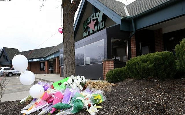 A small memorial for Srinivas Kuchibhotla is displayed outside Austins Bar and Grill in Olathe, Kansas, Friday, February 24, 2017. Kuchibhotla was shot and killed at the bar Wednesday, February 22. (AP/Orlin Wagner)